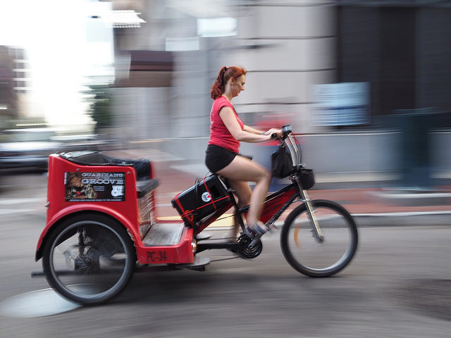 Pedicabs are a convenient way to get around the French Quarter and Marigny. (Photo courtesy via Flickr user Owen Young.)