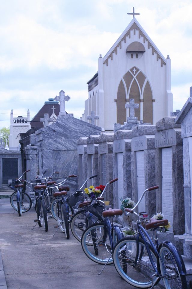 Confederacy of Cruisers offers bicycle tours of New Orleans, including a 9th Ward tour with a stop at the St. Roch Cemetery. (Photo courtesy via Flickr user jodi0327.)