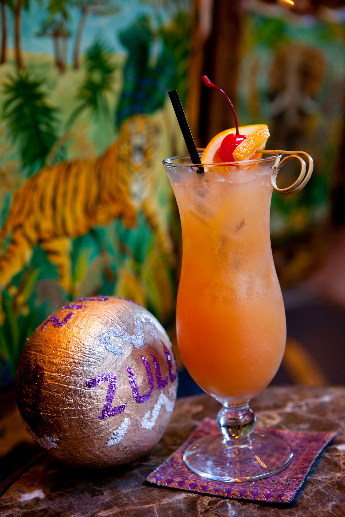 This tropical coconut punch is inspired by the world-famous Zulu Social Aid & Pleasure Club, who parade every Mardi Gras.
