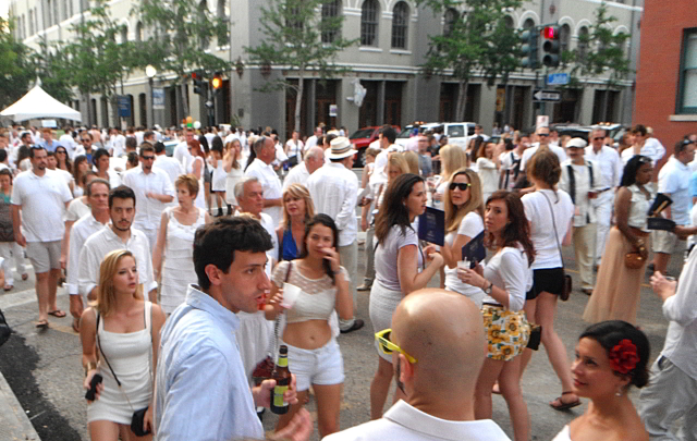Whitney White Linen Night is a free block party in downtown New Orleans mixing art and entertainment. (Photo via Flickr user John W. Schulze)