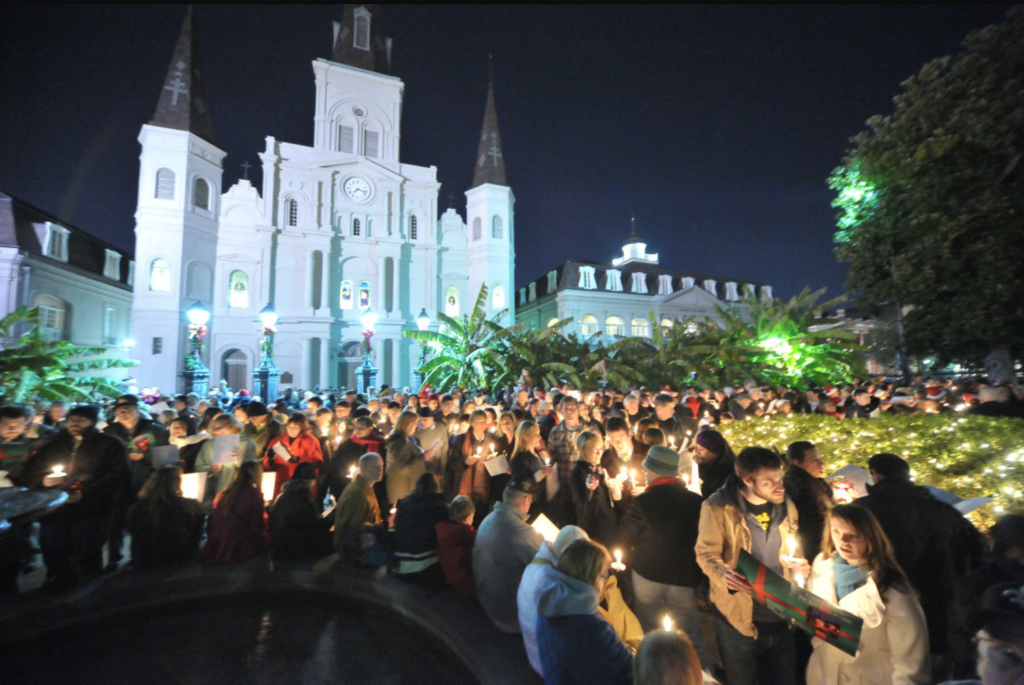 Caroling in jackson square, one of the top reasons to book your French Quarter stay at Hotel Monteleone this holiday season 