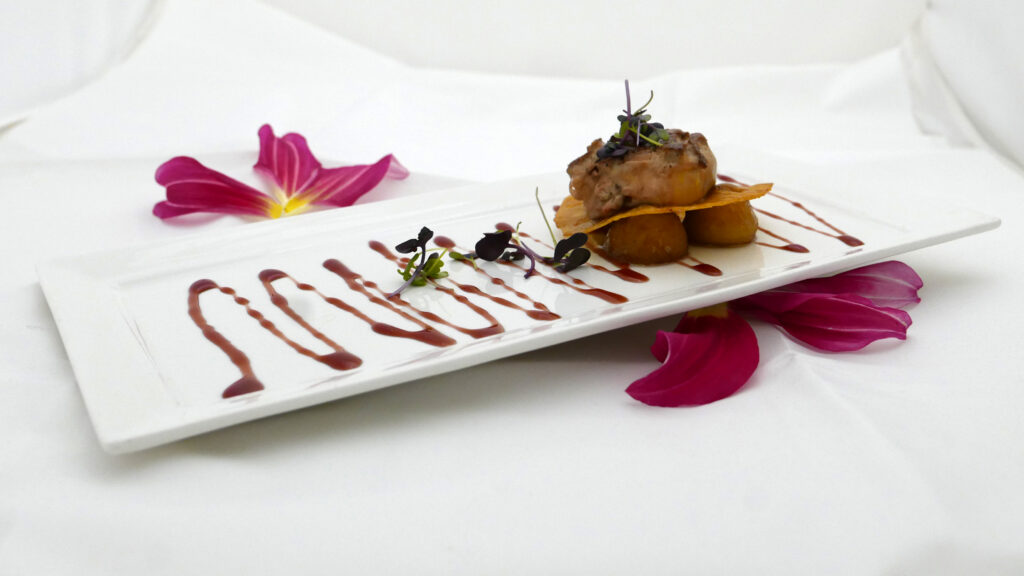 The first course of Valentine's Dinner at Criollo: Seared Foie Gras with southern fried apples and a port wine reduction