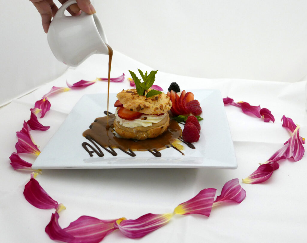 Dessert for Criollo's Valentine's dinner menu: Strawberry Paris-Brest with praline sauce