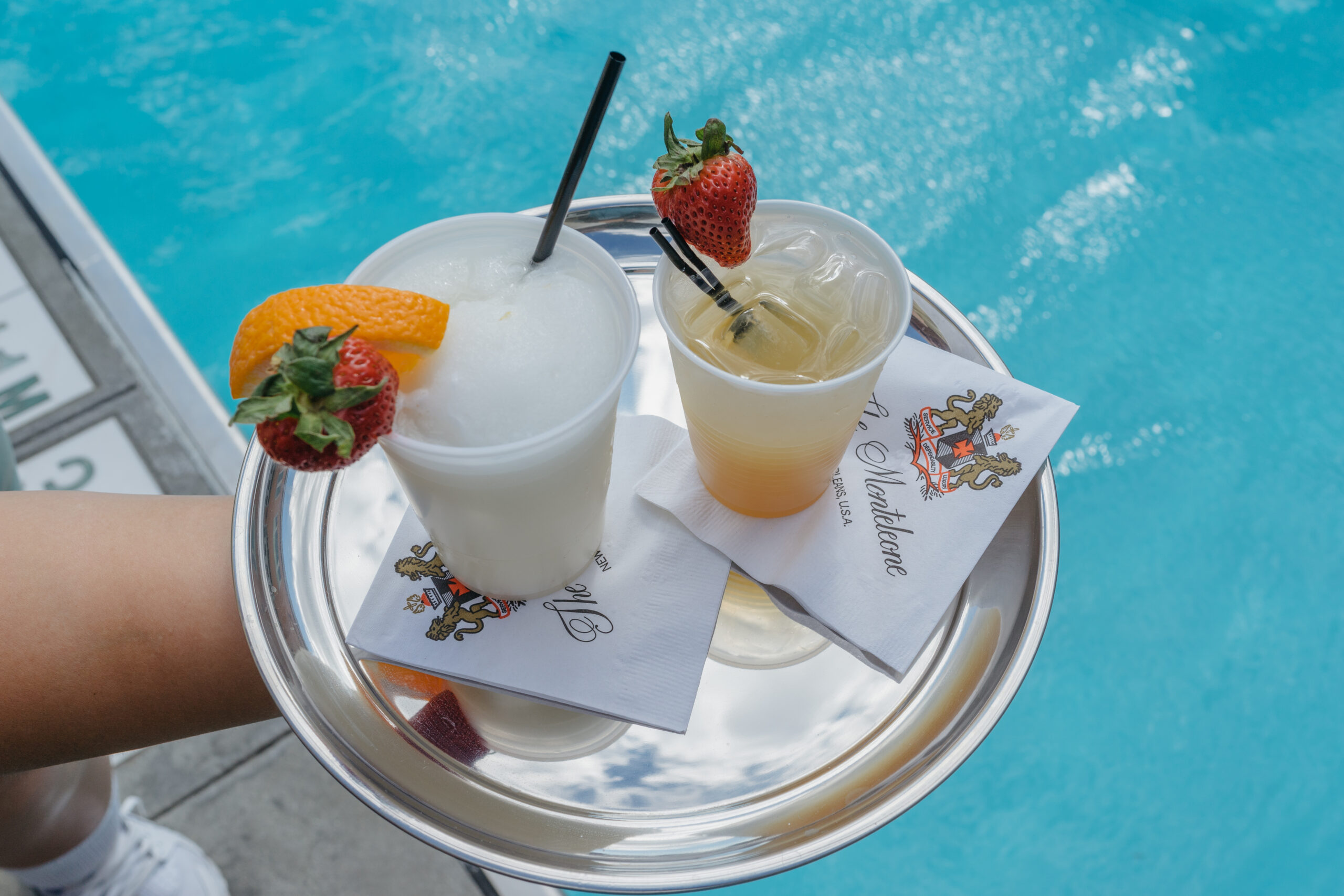 Photo of Acqua Bella cocktails near the pool.
