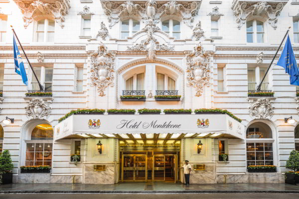 Photo of the Hotel Monteleone's grand front entryway with doorman waiting to welcome visitors.