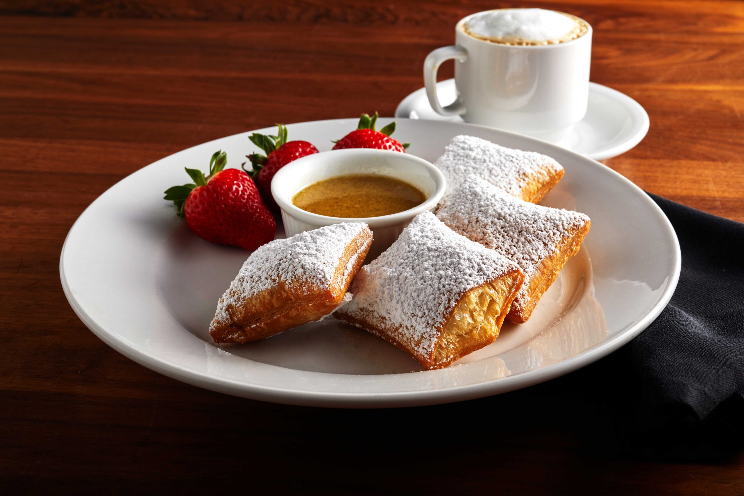 Beignets and strawberries