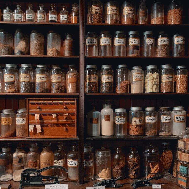 Rows of shelves with vintage apothecary jars filled with ingredients of all textures and tones