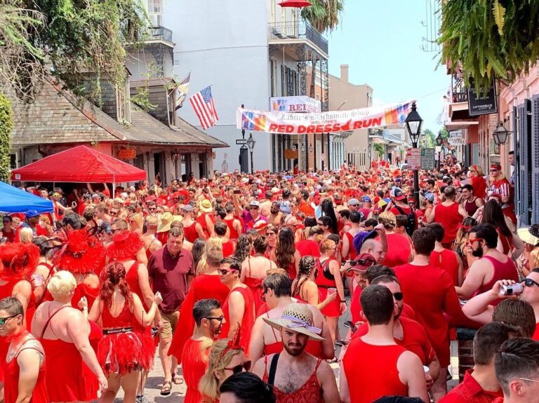 A see of red-dressed revelers gather in the French Quarter to celebrate Red Dress Run