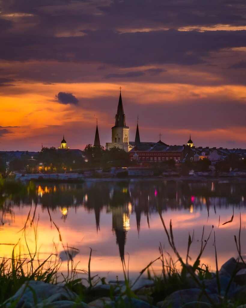 Historic St. Louis Cathedral over the Mississippi River at sunset